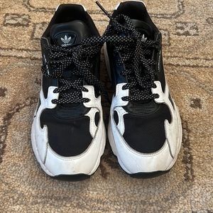 Black and white “dad” sneakers.